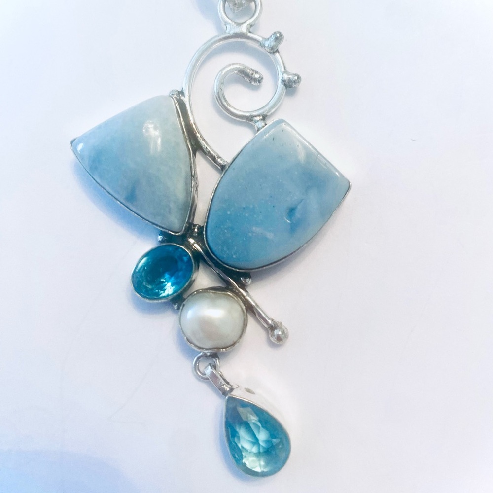 3 inch, Owyhee Opal, Blue Topaz, and Pearl pendant on a silver chain. - Picture 2 of 5